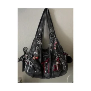 Black charm-embellished shoulder bag, front view.